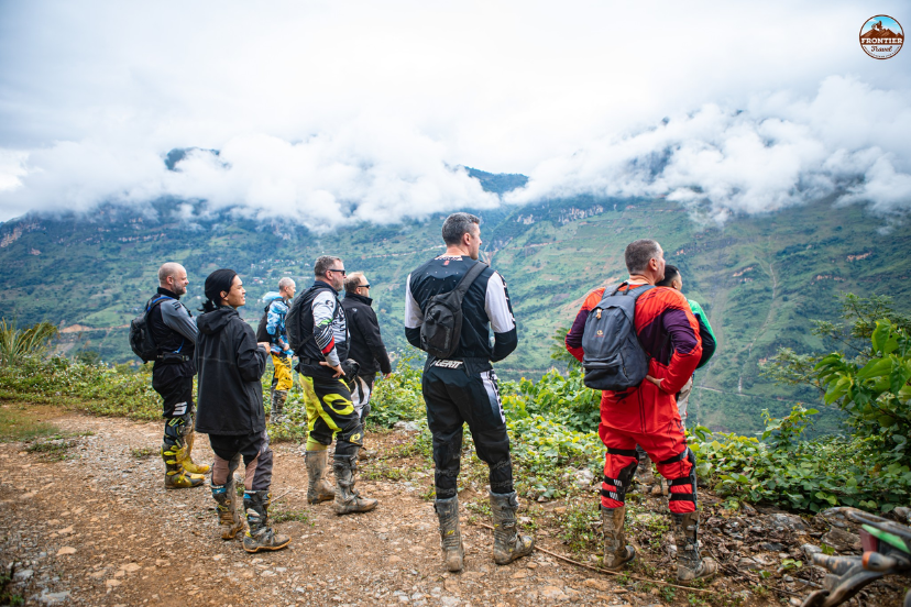 Travelers enjoying the dramatic mountain landscapes and sea of clouds in northern Vietnam